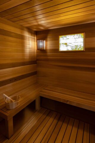 Steam Sauna- custom built cedar tongue and groove walls and cedar floors and benches
