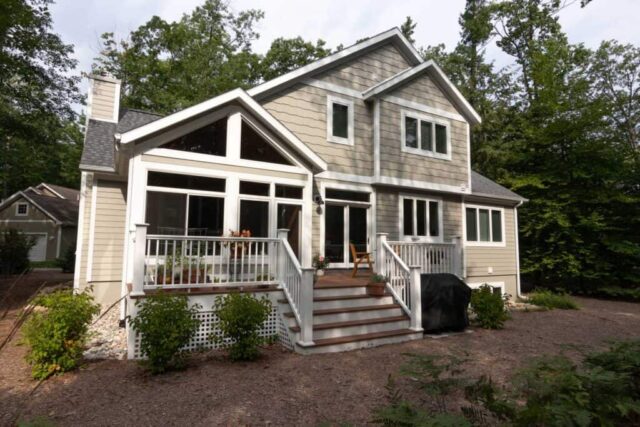 Three-season porch on a Woodstone custom home in Glen Arbor, Michigan